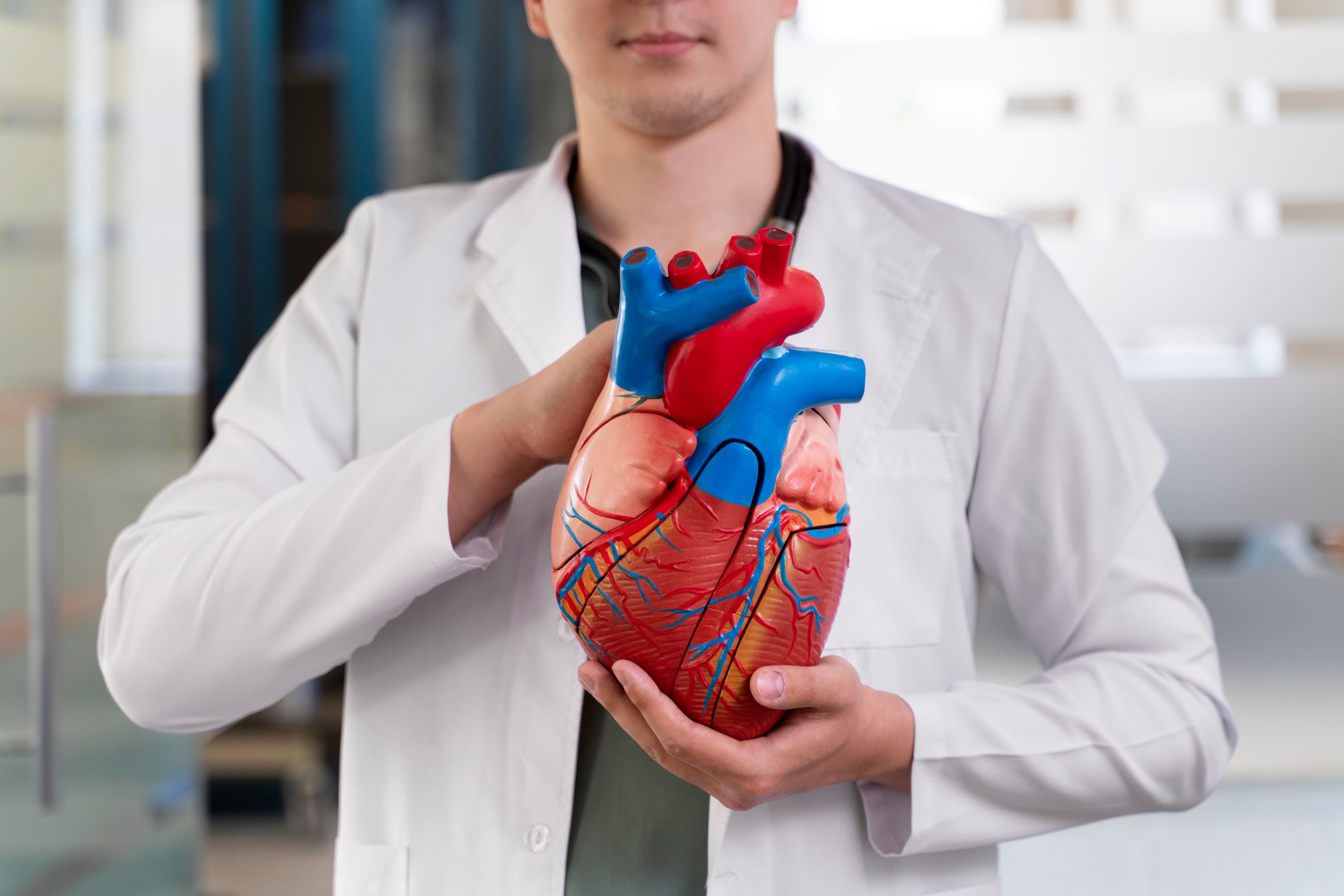 Cardiac surgery team operating with modern equipment